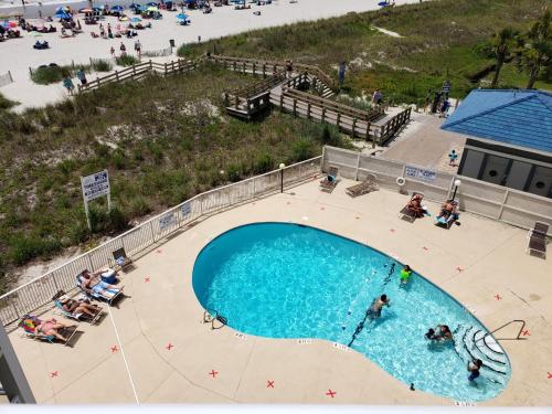an overhead view of a swimming pool at a resort at A Place at the Beach 406 in Myrtle Beach