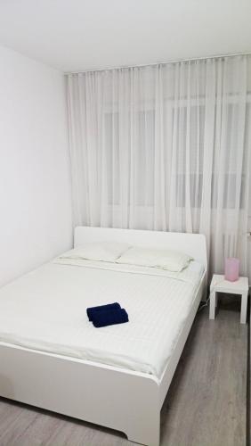 Ένα ή περισσότερα κρεβάτια σε δωμάτιο στο Milan