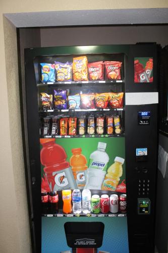 a refrigerator filled with lots of food and drinks at Bristol Arcadia Inn in Bristol