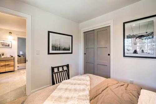 a bedroom with a bed and a hallway with a bathroom at Private Hot Tub Family-Friendly Lake Tahoe House in Kings Beach