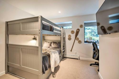 a bedroom with a bunk bed and a desk at Private Hot Tub Family-Friendly Lake Tahoe House in Kings Beach