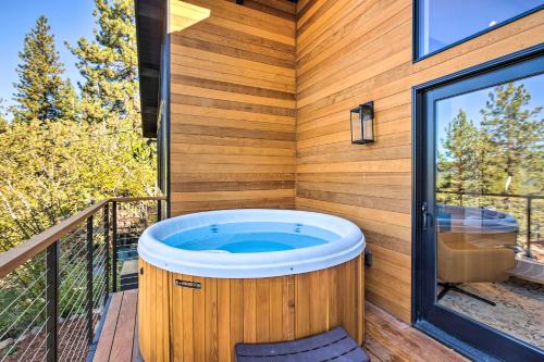 a jacuzzi tub on the deck of a house at Private Hot Tub Family-Friendly Lake Tahoe House in Kings Beach