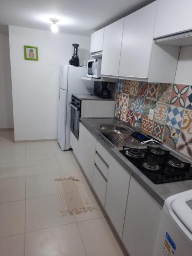 Dapur atau dapur kecil di Cumbuco Residencial Dunas Beach apt.203
