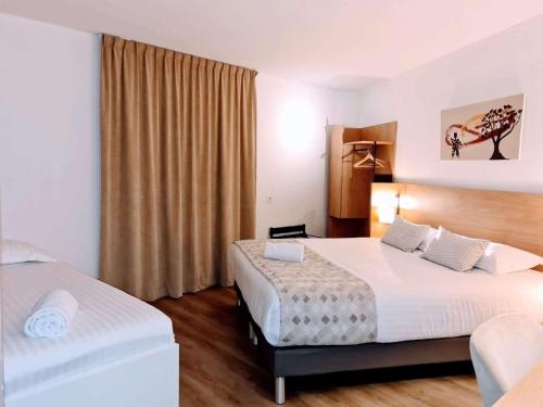 Postel nebo postele na pokoji v ubytování Best Western Hotel & Spa Austria-La Terrasse