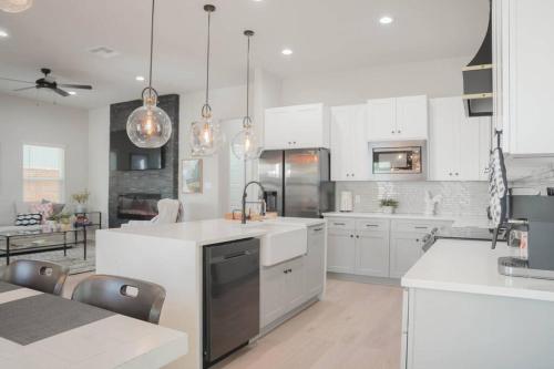 a kitchen with white cabinets and a white counter top at The Retreat at Rigsby-All new 3bdrm/2.5 bath in San Antonio