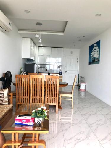 a kitchen and living room with a table and chairs at Hotel,Căn Hộ Mũi Né Sea link in Phan Thiet