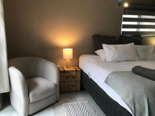 Katil atau katil-katil dalam bilik di Aluve Guesthouse