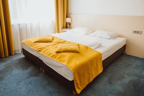 Ένα ή περισσότερα κρεβάτια σε δωμάτιο στο Arche Hotel Siedlce
