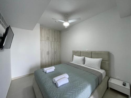 Postel nebo postele na pokoji v ubytování Skyview II
