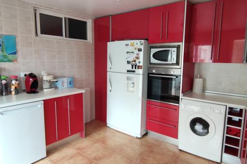 A kitchen or kitchenette at Apart. tranquilo junto al mar grandes terrazas