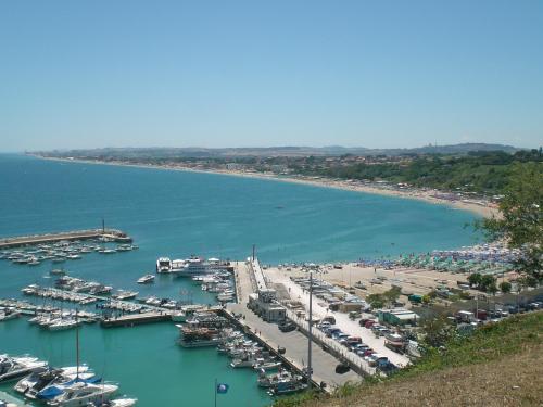 an aerial view of a marina with boats in the water at I Ciliegi in Osimo
