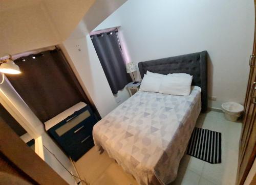 Ένα ή περισσότερα κρεβάτια σε δωμάτιο στο KSL Residence