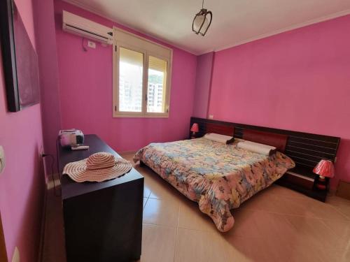 Posteľ alebo postele v izbe v ubytovaní Lungomare Vlore Seaside Apartment