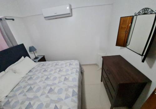 Ένα ή περισσότερα κρεβάτια σε δωμάτιο στο KSL Residence