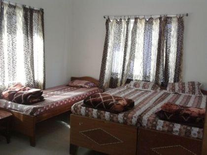 Кровать или кровати в номере NEW HORIZON