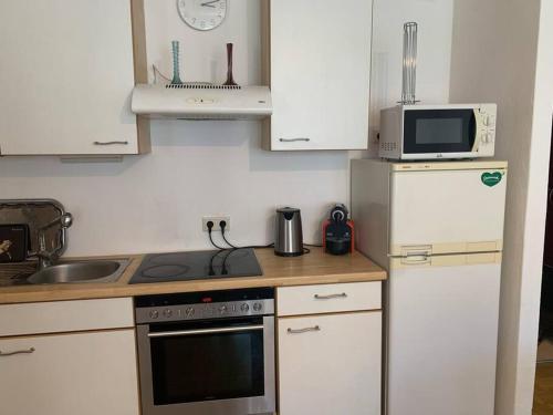 Una cocina o cocineta en Kleine Wohnung im Zentrum Graz