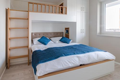 Ένα ή περισσότερα κρεβάτια σε δωμάτιο στο 5 Sterne Penthouse DeichSuite