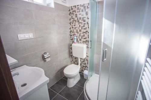 Kúpeľňa v ubytovaní Mona Apartman