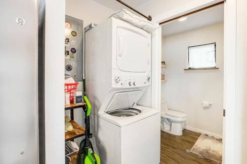 a laundry room with a washer and dryer at River Otter in Nehalem