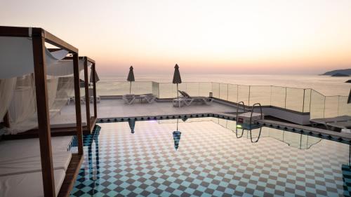 a swimming pool on a ship with the ocean at Blue Bay Lifestyle - ex Bali Blue Bay in Balíon