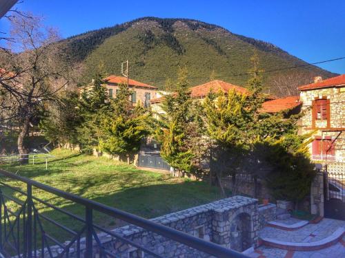 a view from a balcony of a town with a mountain at "Epidavros" Apartment of Levidi Arcadian Apartments in Levidi