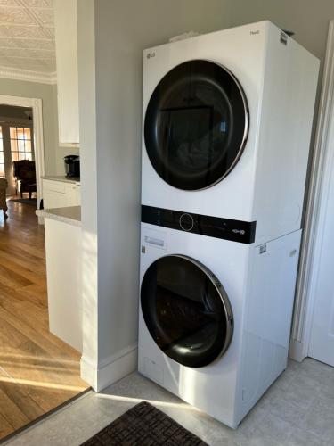 two washing machines stacked on top of each other at Breakwater Lodge in Lower Woods Harbour