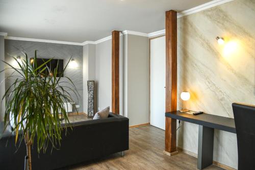 Coin salon dans l'établissement Hotel Zum Weissen Ross