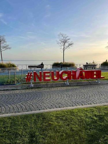 a sign that says the nuremberg on a street at V&V CENTRE Neuchatel in Neuchâtel