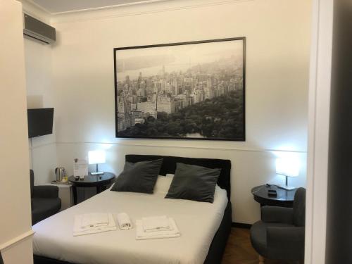 ELEGANT ROOMS PARIOLIにあるベッド