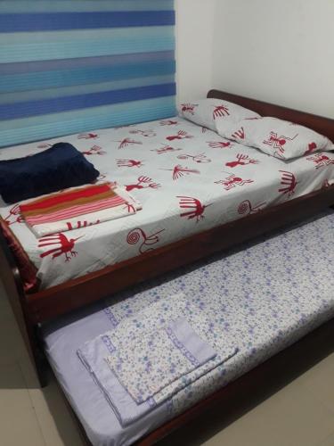 Llit o llits en una habitació de Arena Plaza Tonsupa