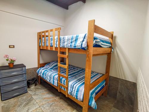 Un ou plusieurs lits superposés dans un hébergement de l'établissement MAMA QUCHA - BEACH HOUSE / Casas de playa DIOSA DEL MAR