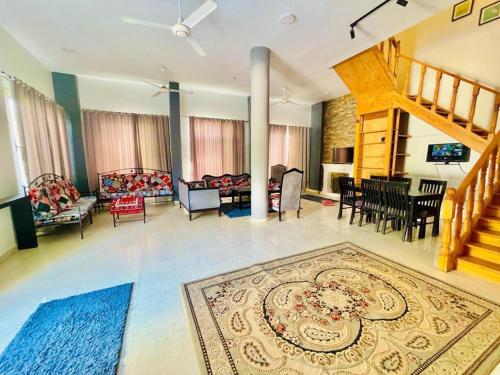 a living room with a rug on the floor at Ali Luxury Villa in Luxor
