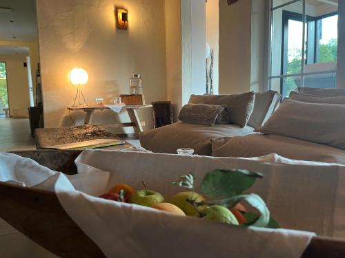a box full of fruit in a living room at NaturApartments - Hideaway & Spa in Burg