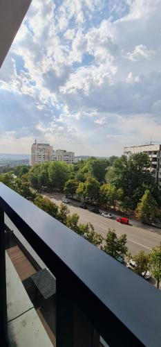 a view of a parking lot from a balcony at OASIS-RENT in Chişinău