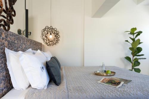 Кровать или кровати в номере Naillac Boutique Hotel