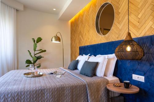 Кровать или кровати в номере Naillac Boutique Hotel