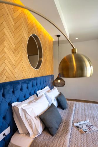 Кровать или кровати в номере Naillac Boutique Hotel