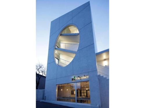 a building with a round window on the side of it at Megu fuji 2021 - Vacation STAY 74532v in Fujiyoshida