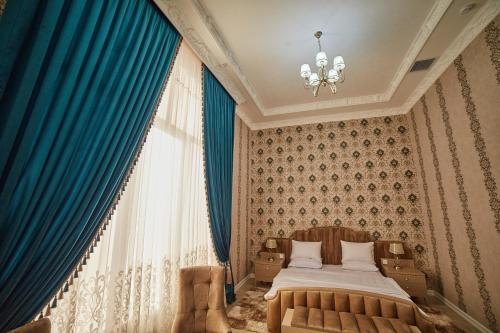 Ένα ή περισσότερα κρεβάτια σε δωμάτιο στο Comfort Hotel Samarkand
