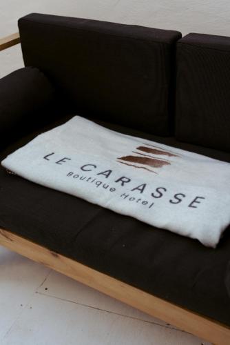Coin salon dans l'établissement Le Carasse Boutique Hotel