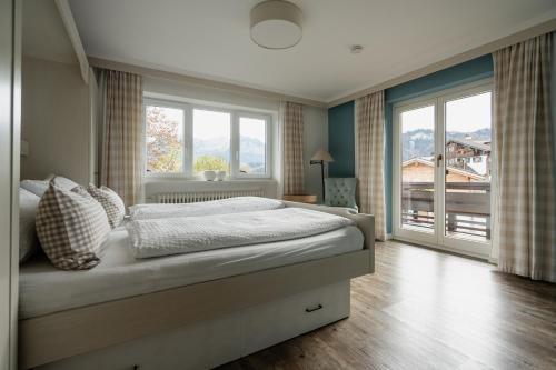 Cama o camas de una habitación en Gästehaus Dauser
