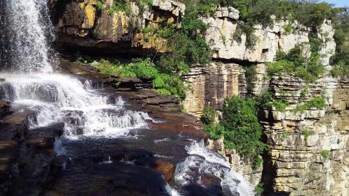 a waterfall on the side of a rocky mountain at The Farmers Lodge in Thorndale