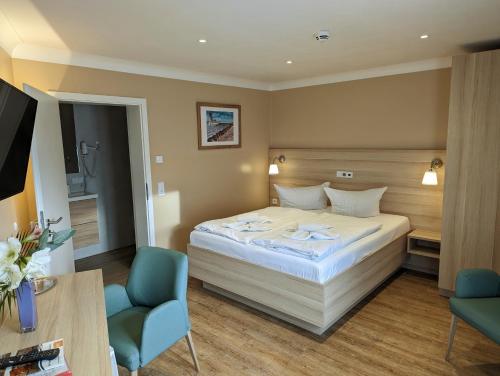 Ένα ή περισσότερα κρεβάτια σε δωμάτιο στο Hotel Karl's Burg