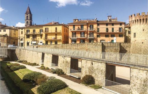 a bridge over a city with buildings in the background at Fico, Oliva, Mora in Calzolaro