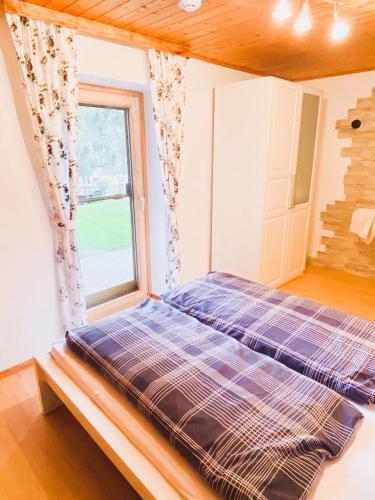 Postel nebo postele na pokoji v ubytování Ferienwohnung Steinberger