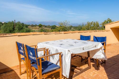 a table and chairs sitting on a patio at Finca Pep in Sineu