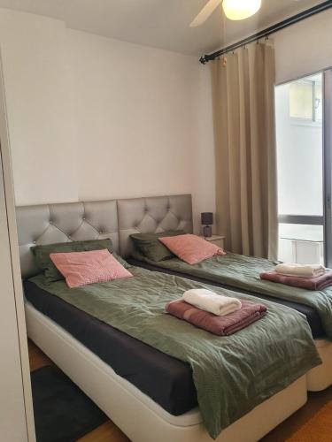 Ένα ή περισσότερα κρεβάτια σε δωμάτιο στο Modern, cozy studio n:o 120