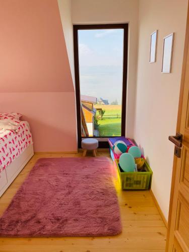 Katil atau katil-katil dalam bilik di Scenic Chalet Malowniczy Domek