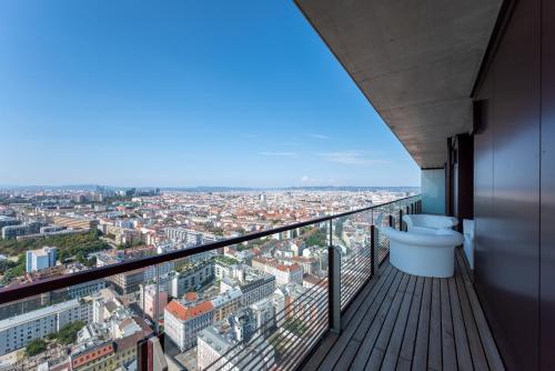 a balcony with a view of a city at Exclusive 2BR Skyline Penthouse by HM in Vienna