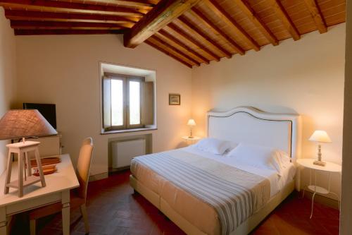 Postel nebo postele na pokoji v ubytování Borgo Sant'Ambrogio - Resort